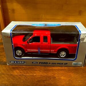 NIB WELLY Red Ford F-350 Pick Up. New in box. Vintage. Never open. Scale 1:24.